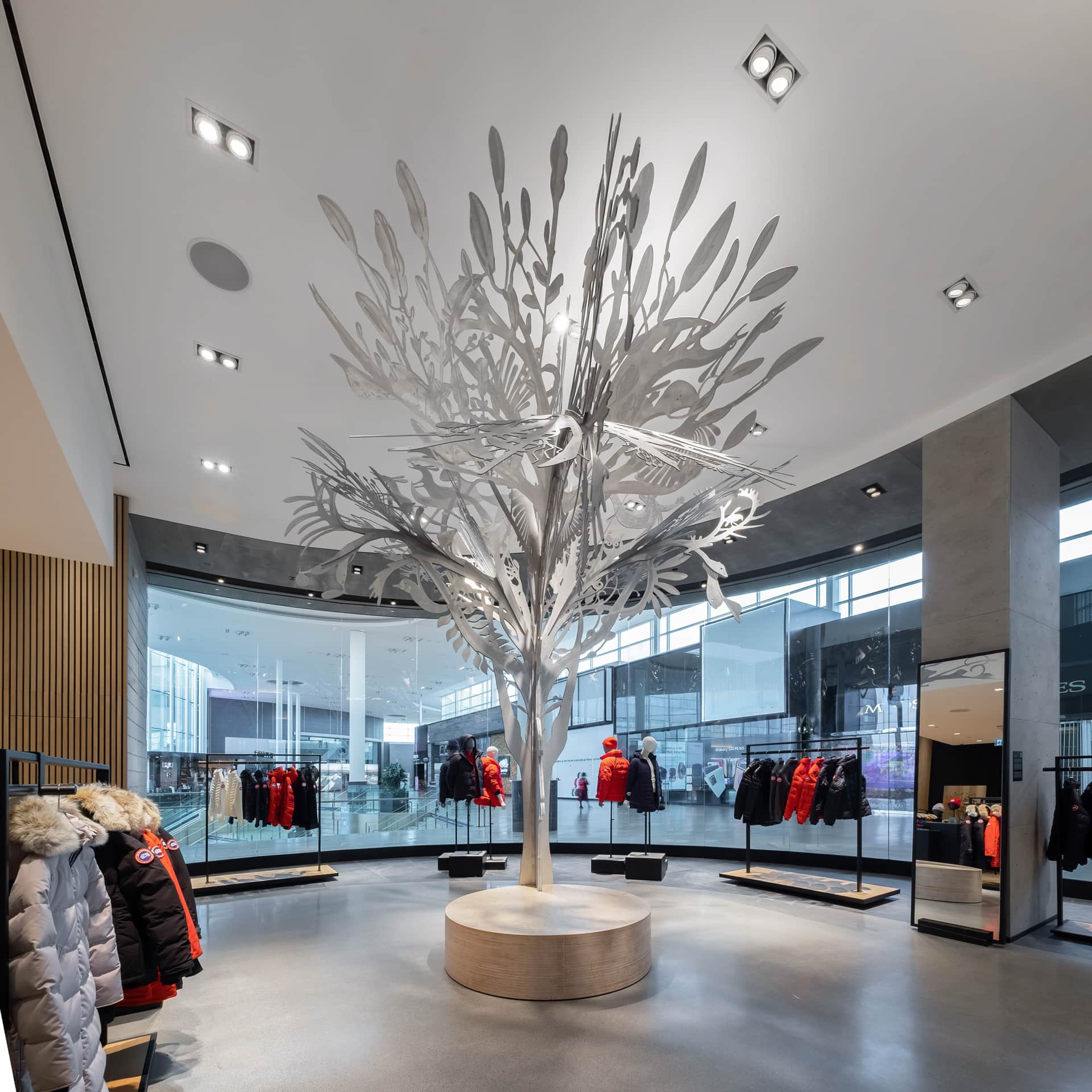 Story Tree by Qavavau Manumie and Alex Fischer at Canada Goose, Yorkdale Mall, Toronto, Canada Artwork 'Story Tree' by Qavavau Manumie and Alex Fischer installed at Canada Goose, Yorkdale Mall, Toronto, Canada